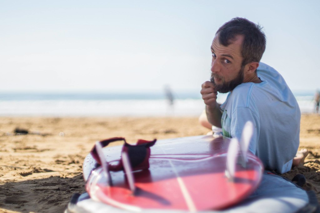 Adam and surfboard